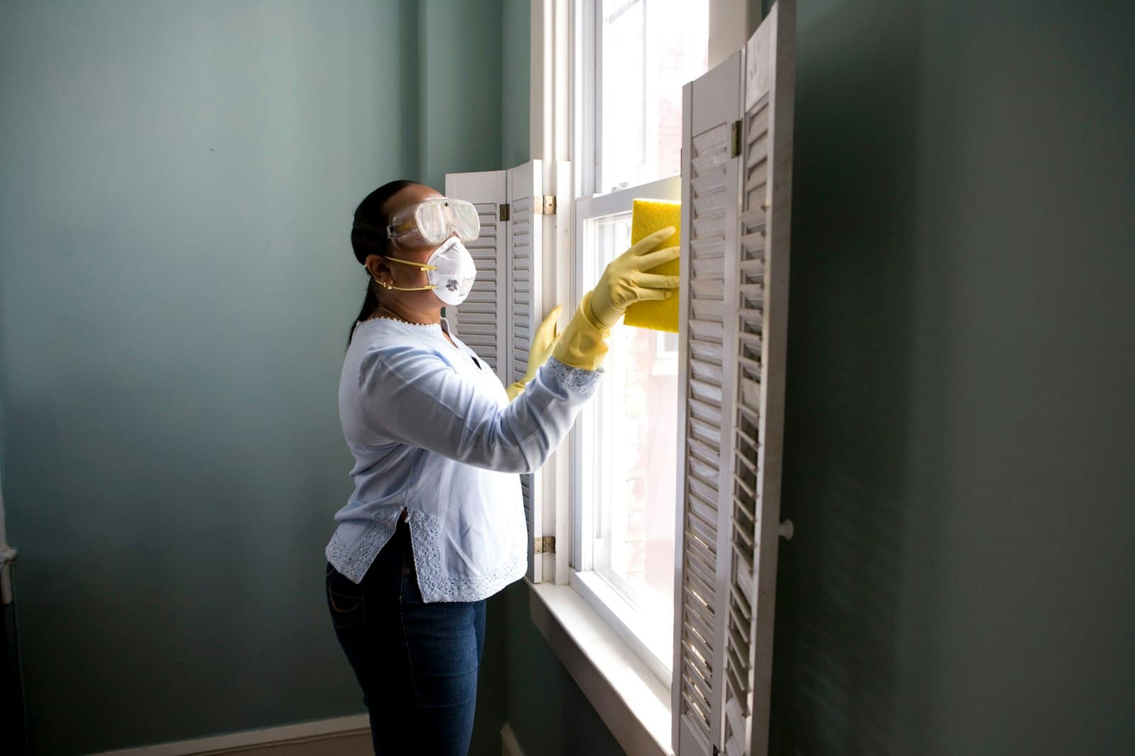 Professional cleaner polishing a bright Florida home interior